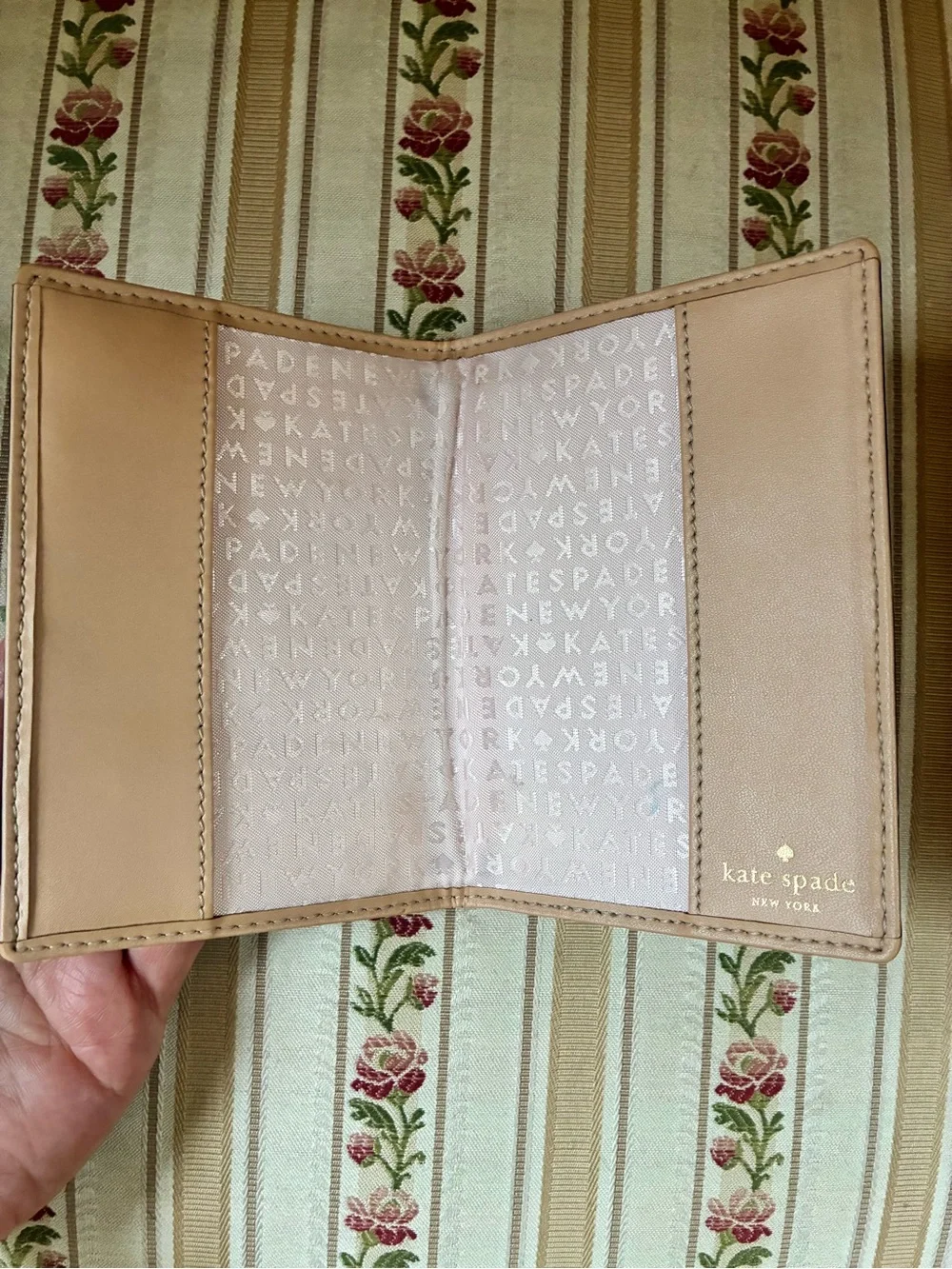 kate spade Metallic Rose Gold Pebbled Passport Cover